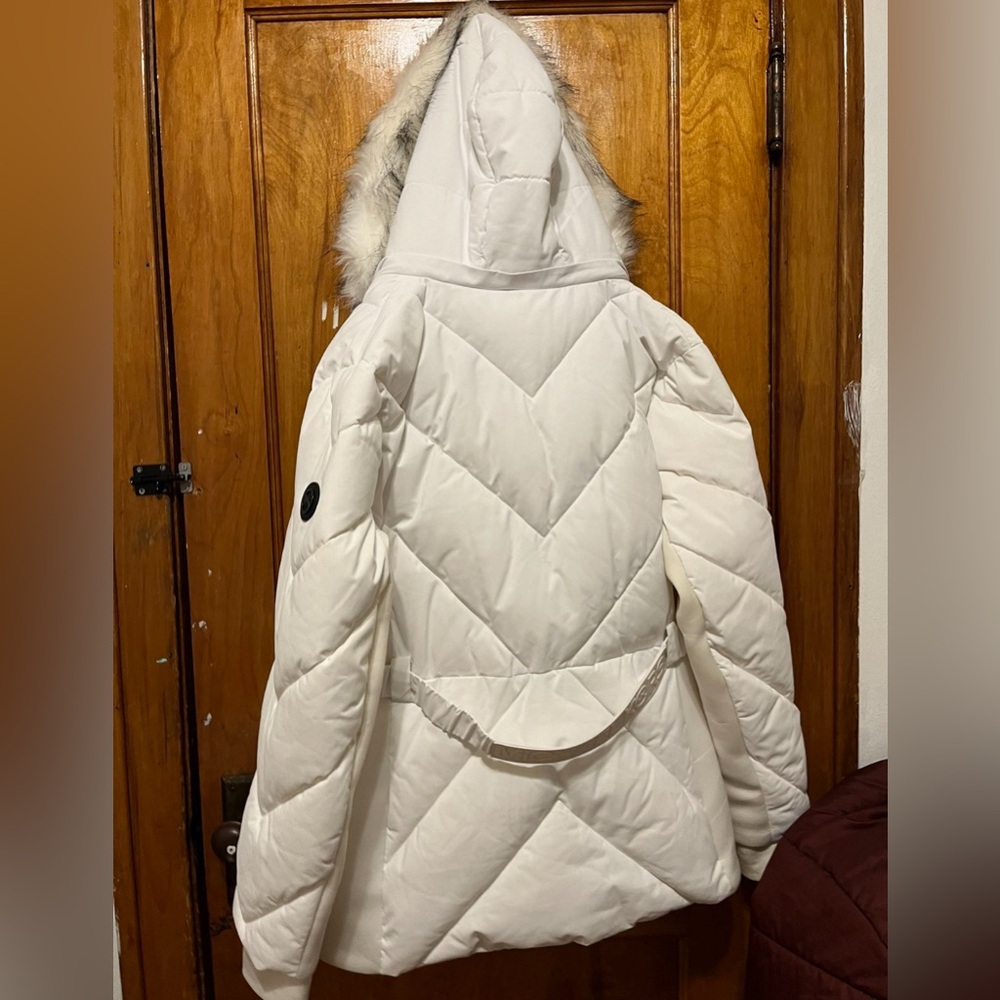This is a brand NEW white Micheal kors jacket